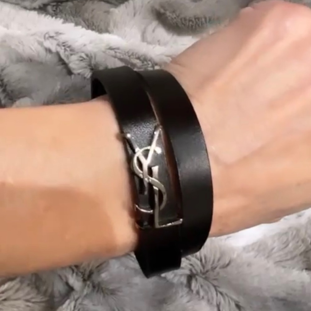 Authentic YSL wrap bracelet w/ Saint Laurent clasp. She’s a stunner🖤
